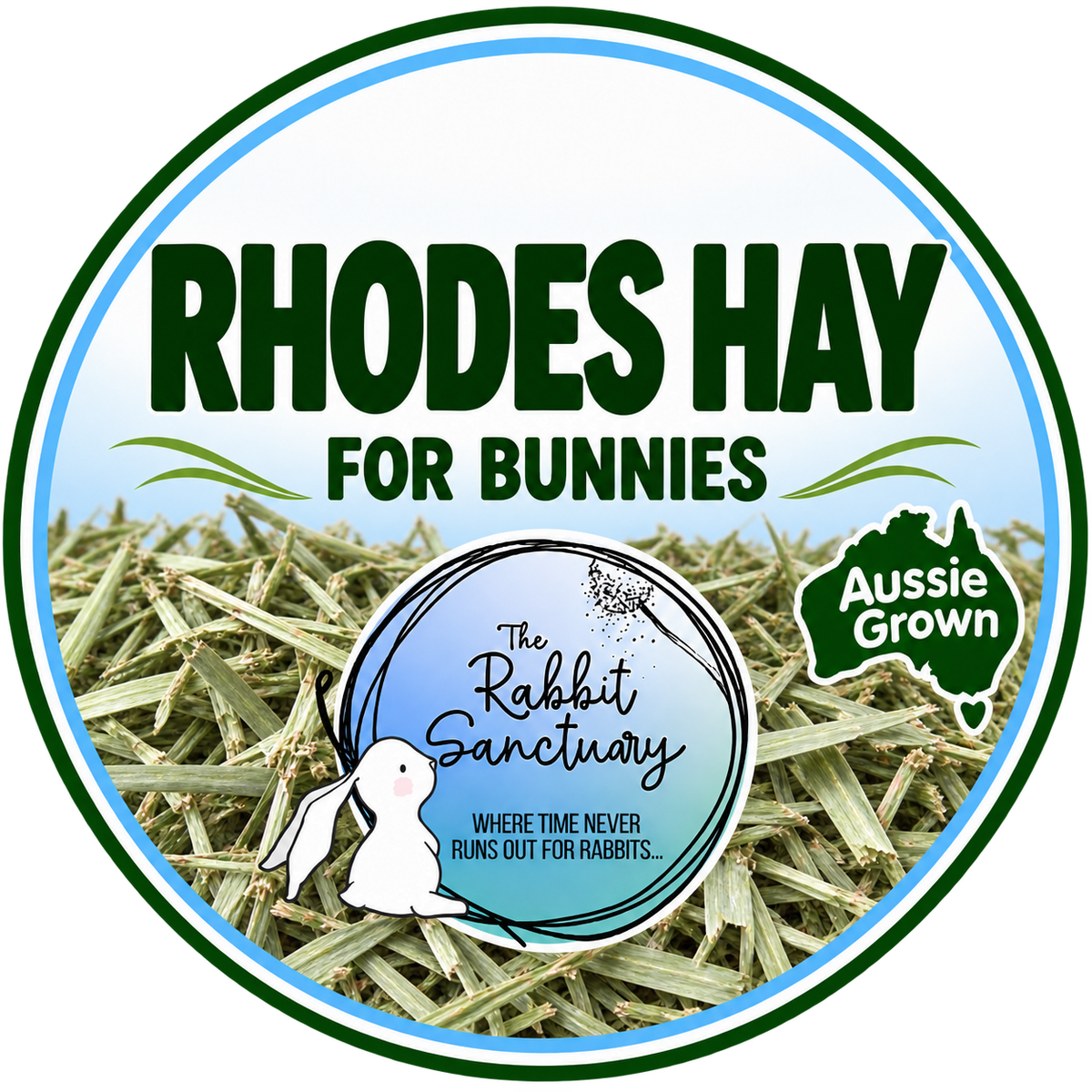 Round product label for Rhodes Hay for Bunnies, showing a close-up of hay strands, large green text, a white rabbit illustration, The Rabbit Sanctuary logo, and an Aussie Grown badge on a white background.